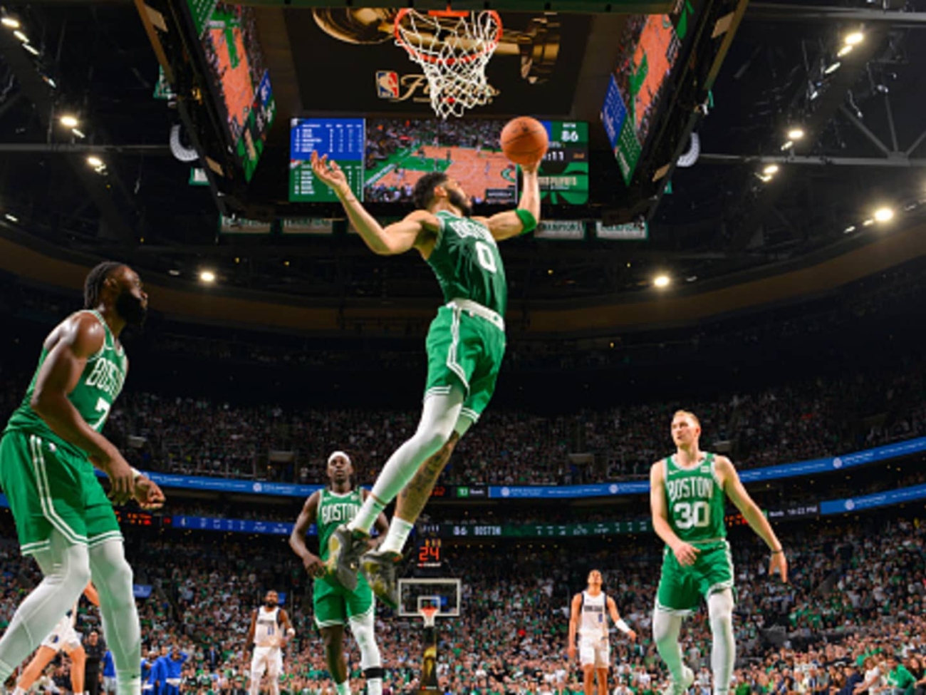 107430163-1718681259196-gettyimages-2157519582-finalsg5_06172024_celtics_mavericks_garrabrant_1506.j.jpeg