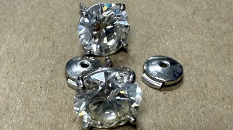 Orlando Police Close up of diamond earrings