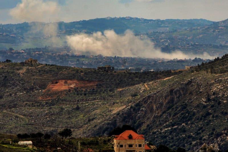 Heavy smoke billows from an Israeli air strike in the southern Lebanese village of Sohmour. STR/dpa