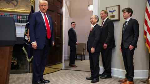 Donald Trump speaks in the Roosevelt Room at the White House, with Masayoshi Son, Larry Ellison and Sam Altman standing nearby