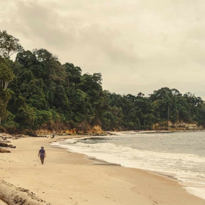 TAL-man-walking-beach-GABON0425-3215762b5d524c57acbbcedbcdb6bb9a.jpg