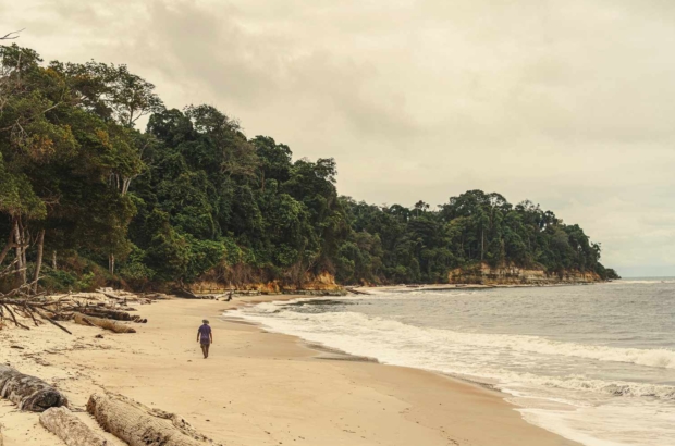 TAL-man-walking-beach-GABON0425-3215762b5d524c57acbbcedbcdb6bb9a.jpg