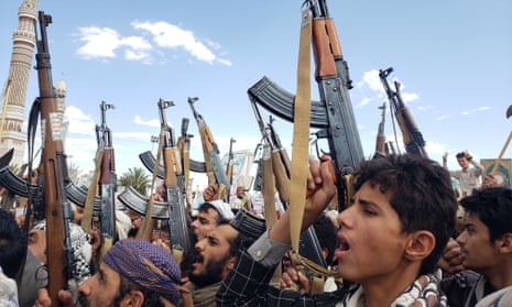 Houthi supporters protest against US airstrikes in Sana’a, Yemen.