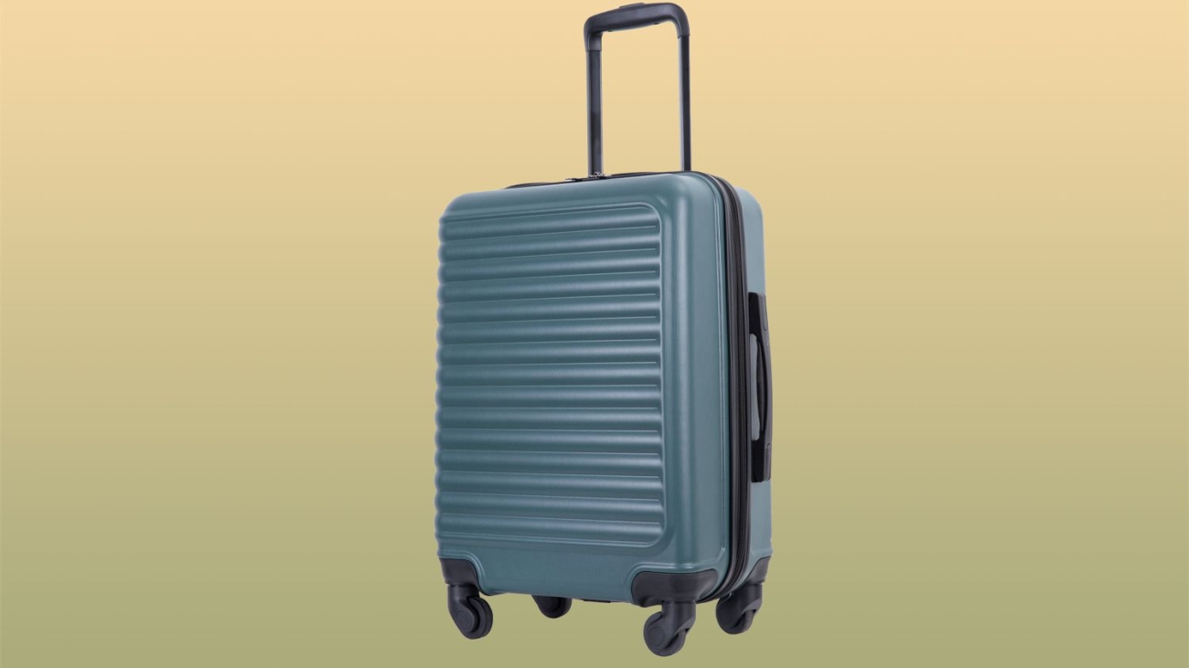 carry-on-suitcase-tl-tout-43c3ad80a80f443ab7223fe5f7e739d2.jpg