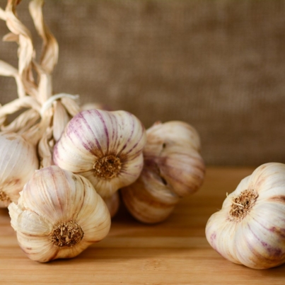 ms-garlic-bulbs-woodensurface-getty-30bcff1a96224352b2f3a4b7789dfb9c.jpg